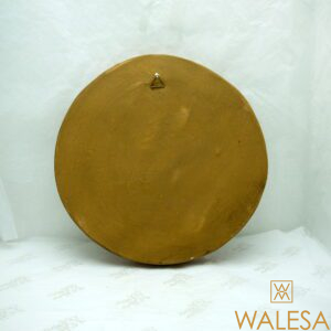 Médaillon plâtre patiné l'enfant endormi