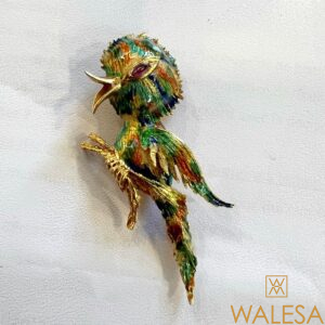Broche or jaune 18K figurant un oiseau branché
