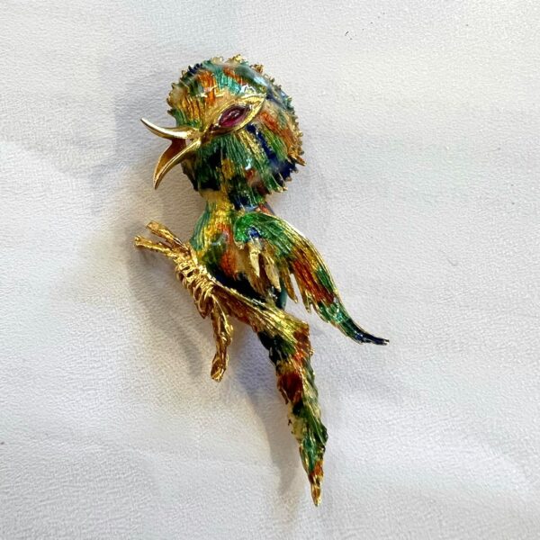 Broche or jaune 18K figurant un oiseau branché