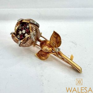 Broche « trembleuse » fleur en or jaune 18k