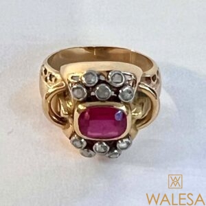 Bague or jaune 18 carats pierre rouge et diamants